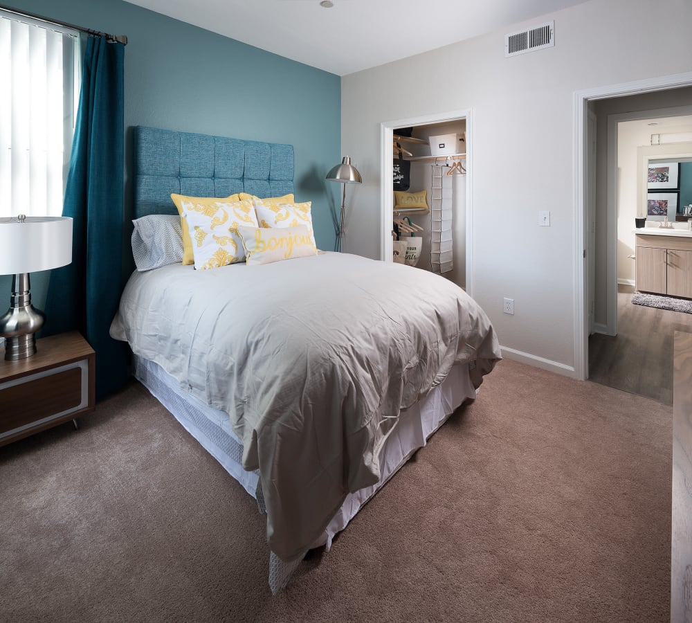 Model bedroom with accent wall at Avoca Dublin Station in Dublin, California