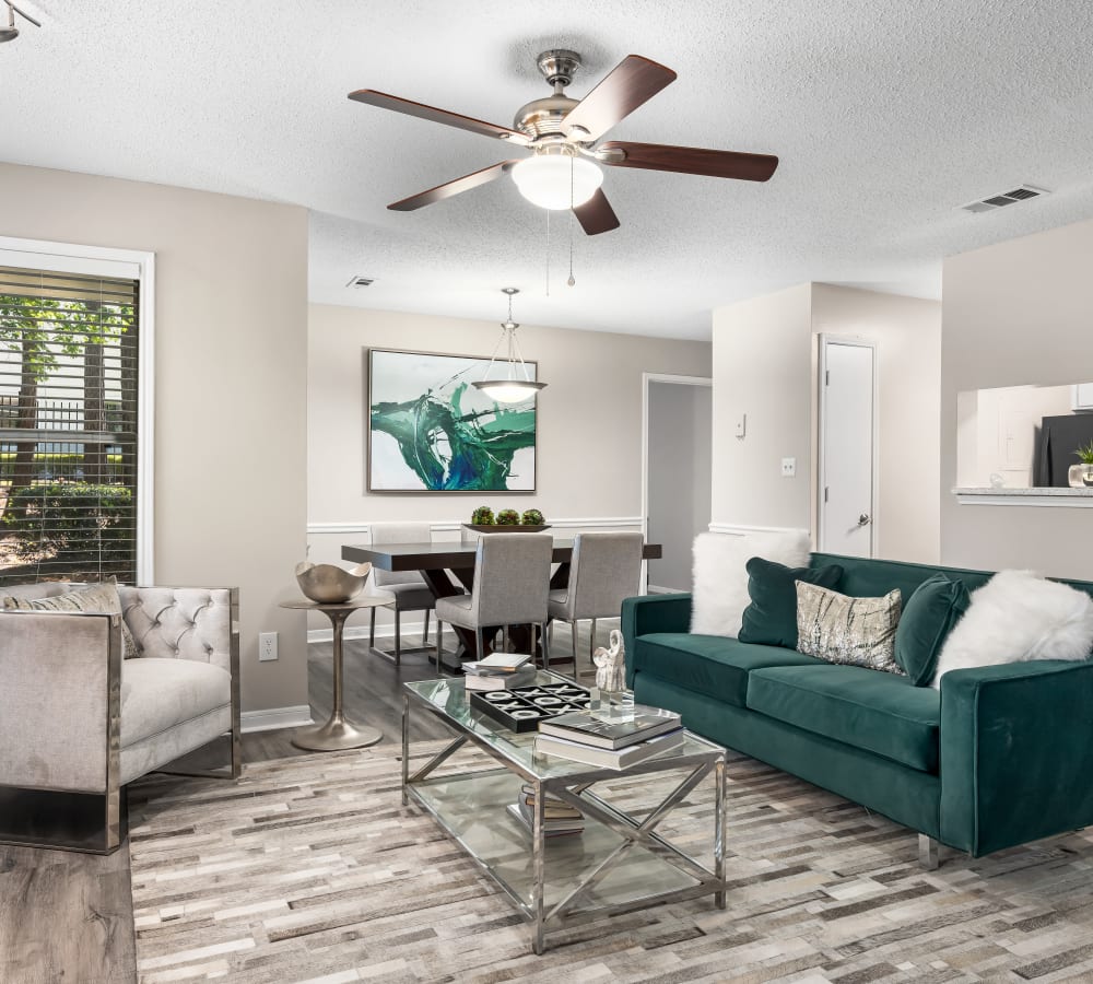 A furnished apartment living room and kitchen at Renaissance at Galleria in Hoover, Alabama