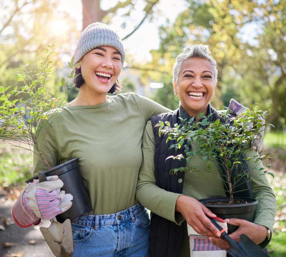 Residents having fun in their garden of Olivera Senior Apartments in Pomona, California