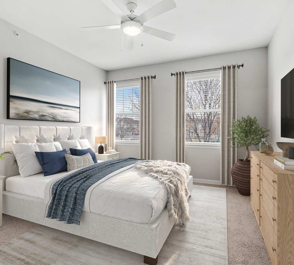 Lots of natural sunlight shining through in this newly renovated bedroom at Briargate on Main in Parker, Colorado