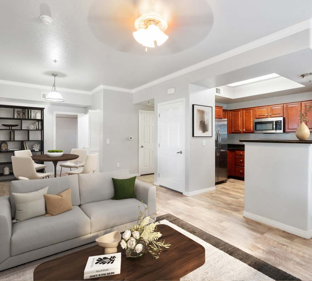 Dining room with wood-style flooring at Wolf Ranch Condominium Rentals in Sacramento, California