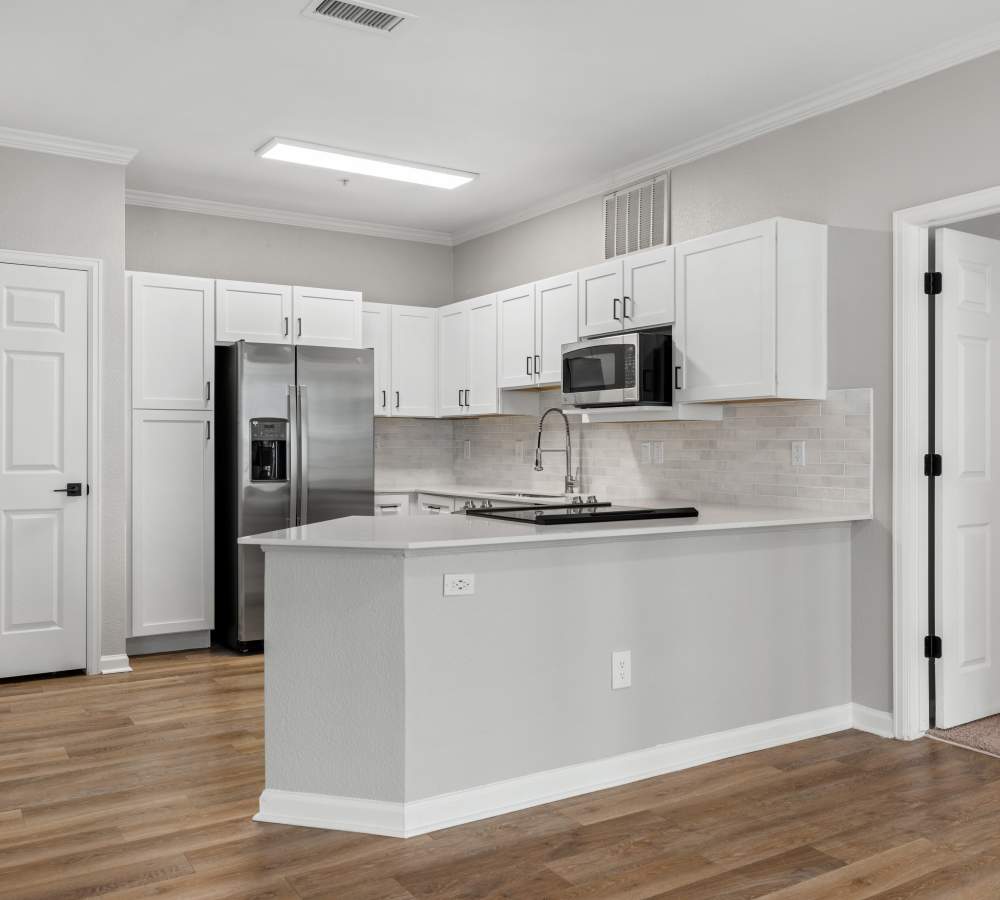 Newly Renovated Kitchen and Huge Breakfast bar at Briargate on Main in Parker, Colorado