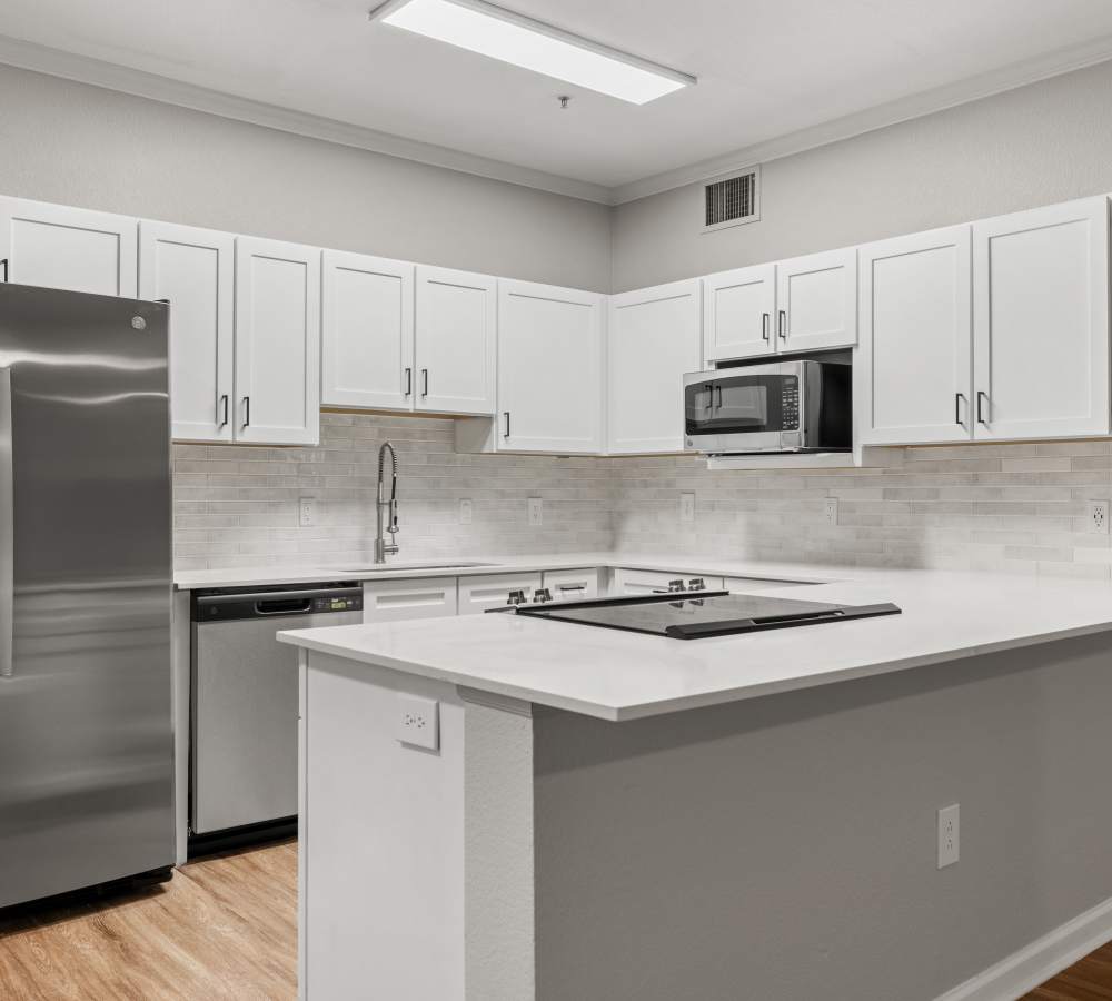 Newly Renovated Kitchen and Huge Breakfast bar at Briargate on Main in Parker, Colorado