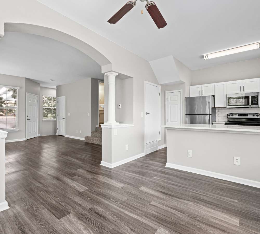 Newly renovated kitchen, dining & living room at Isabella Apartment Homes in Greenwood Village, Colorado