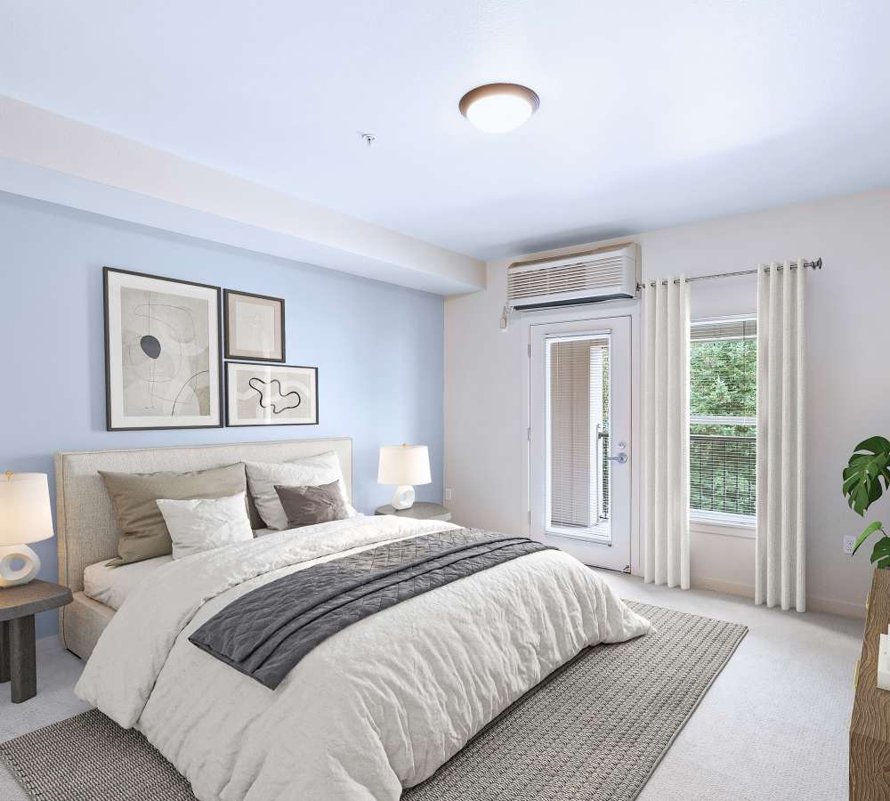 Beautiful bedroom with a large window at Eddyline at Bridgeport in Portland, Oregon