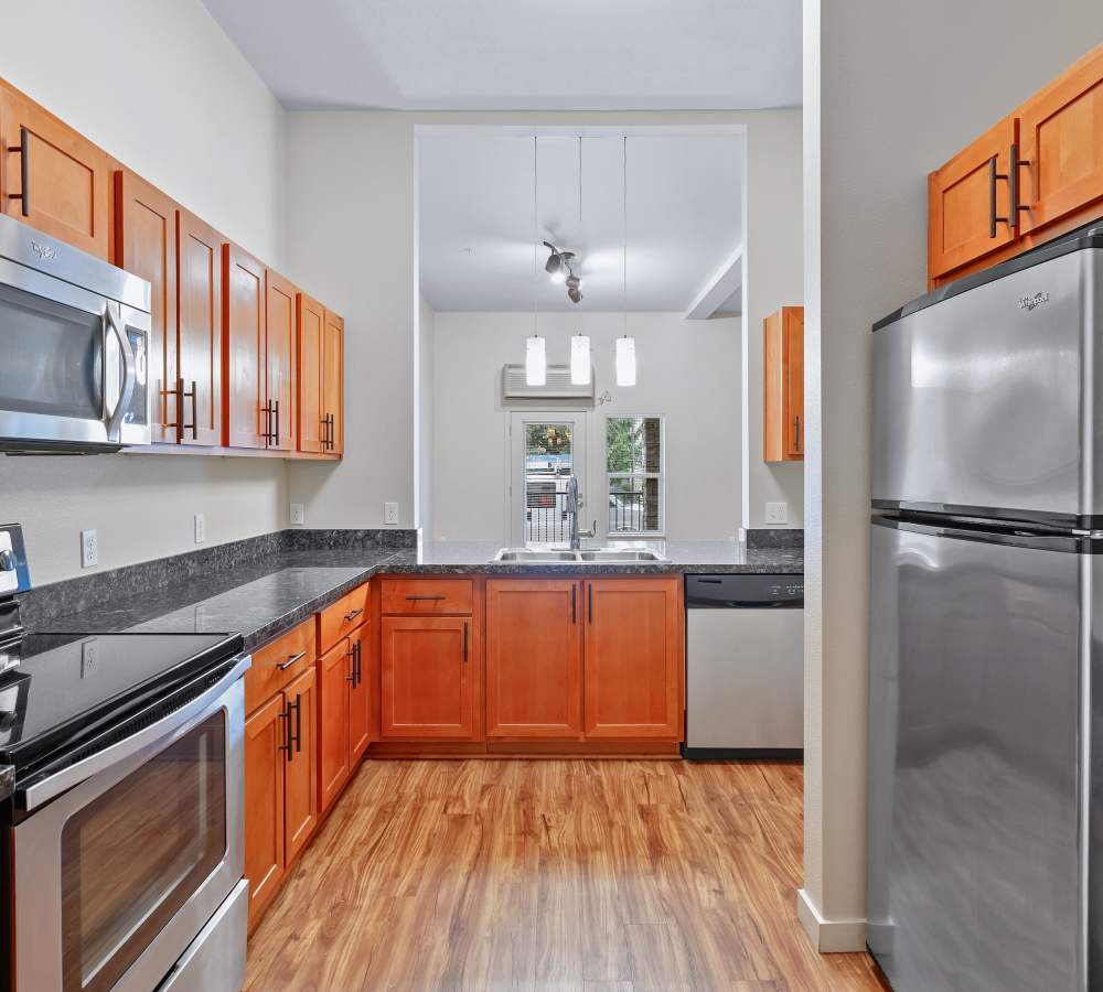 Large kitchen with stainless steel appliances at Eddyline at Bridgeport in Portland, Oregon