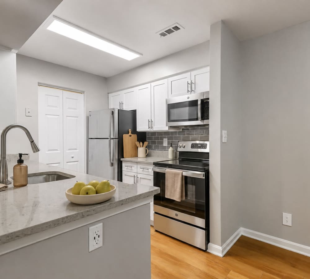Stainless steel appliances in an apartment kitchen at Stonecreek Club in Germantown, Maryland