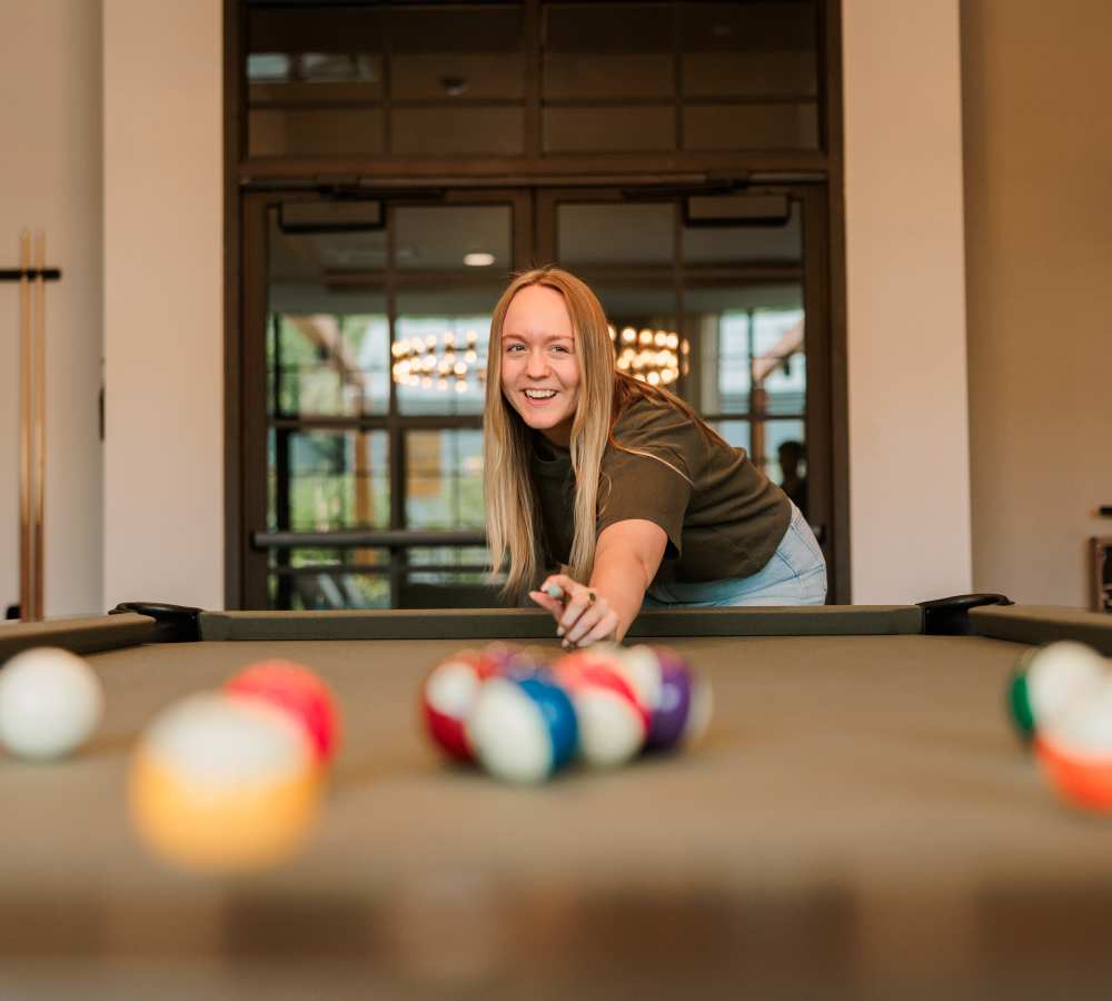 resident playing billiards