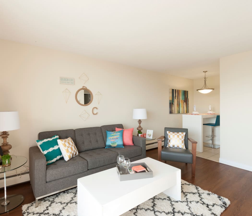Beautiful living room at Calgary Place Apartments in Calgary