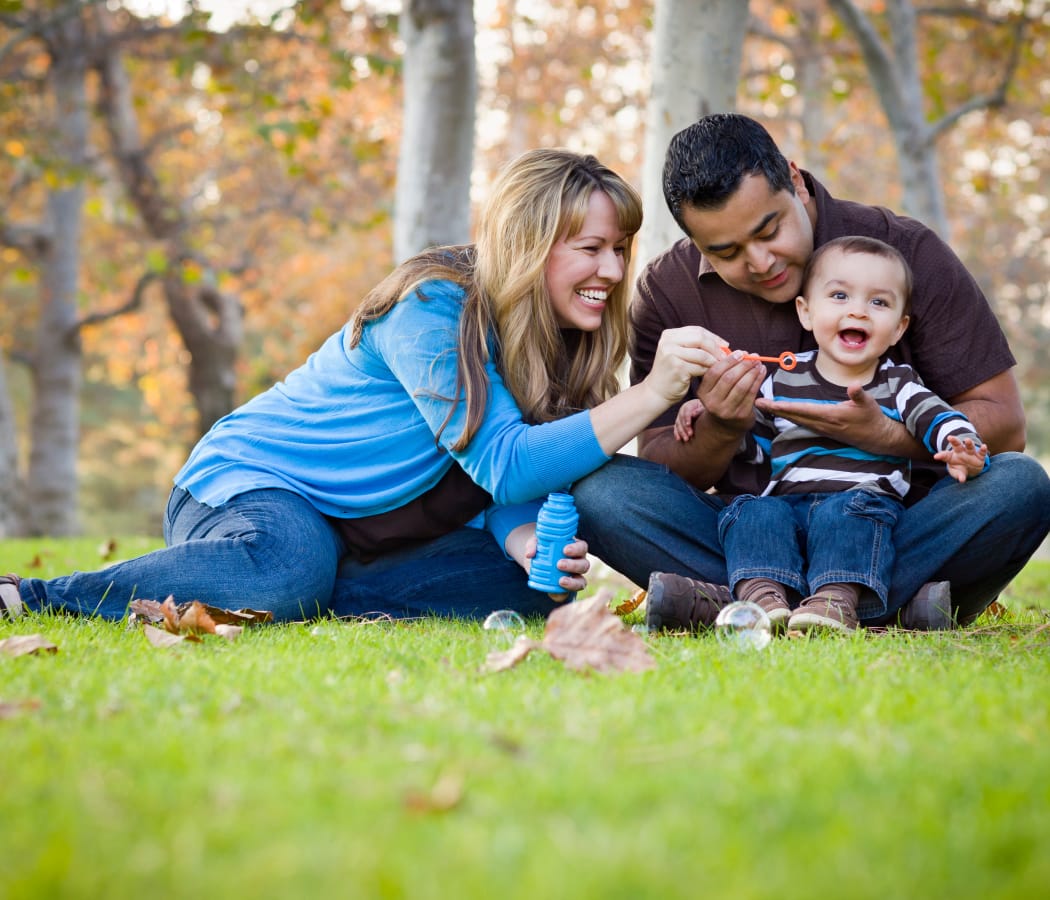 Happy family shopping near Overlook at Thornton in Thornton, Colorado