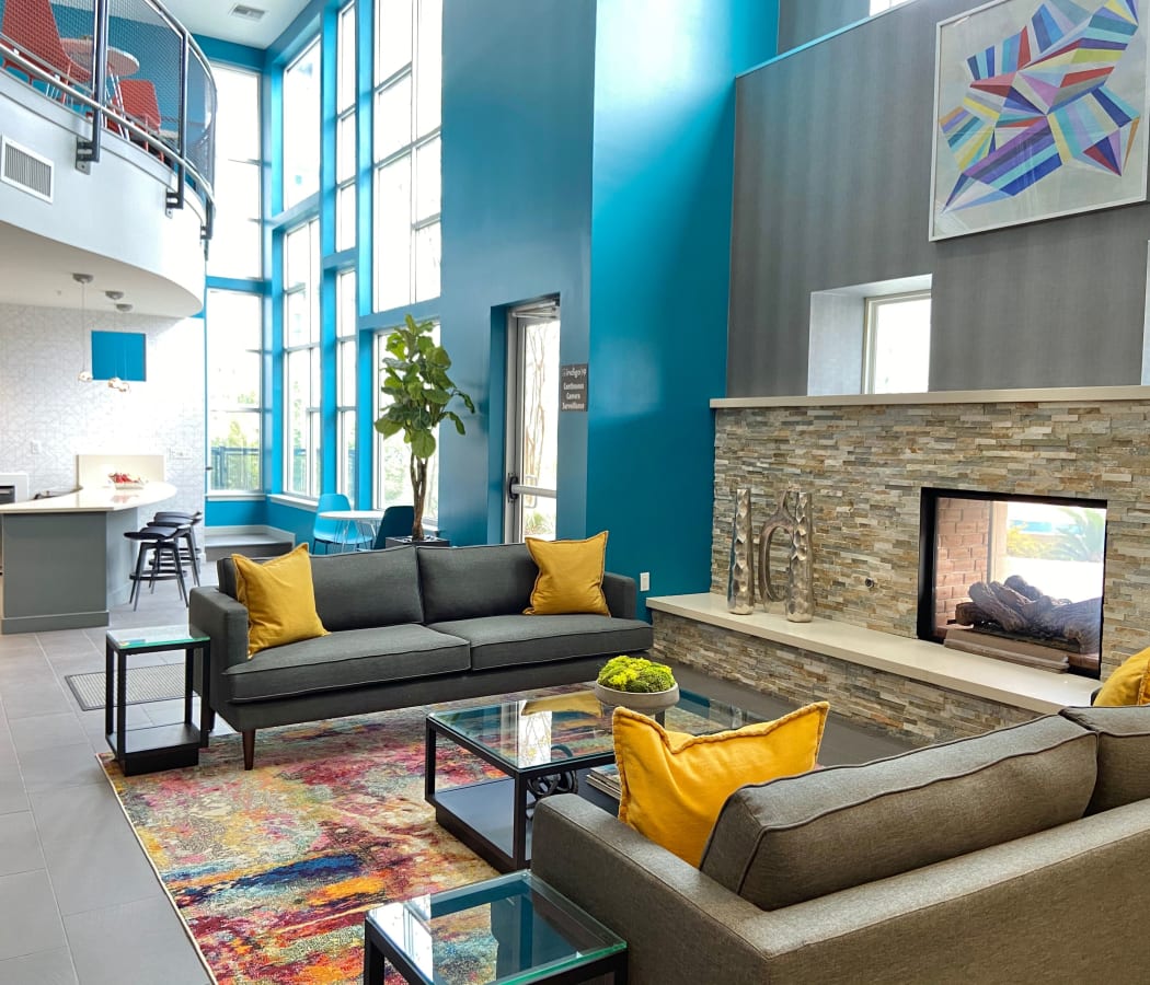 Clubhouse lounge area with a fireplace at Indigo 19 in Virginia Beach, Virginia