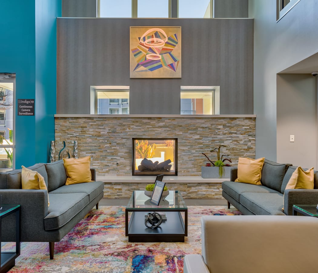 Clubhouse lounge area with a fireplace at Indigo 19 in Virginia Beach, Virginia