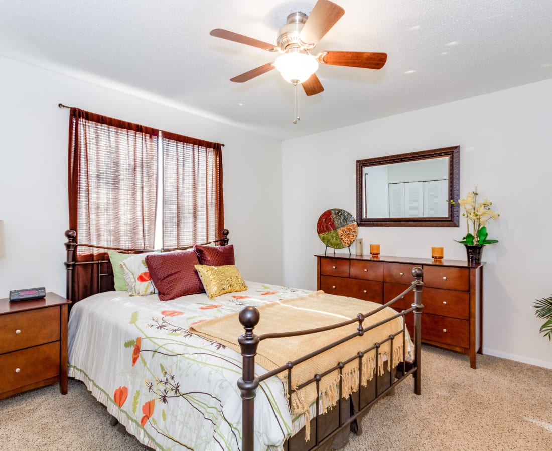 Model bedroom with plush carpeting at Chesterfield Flats in North Chesterfield, Virginia