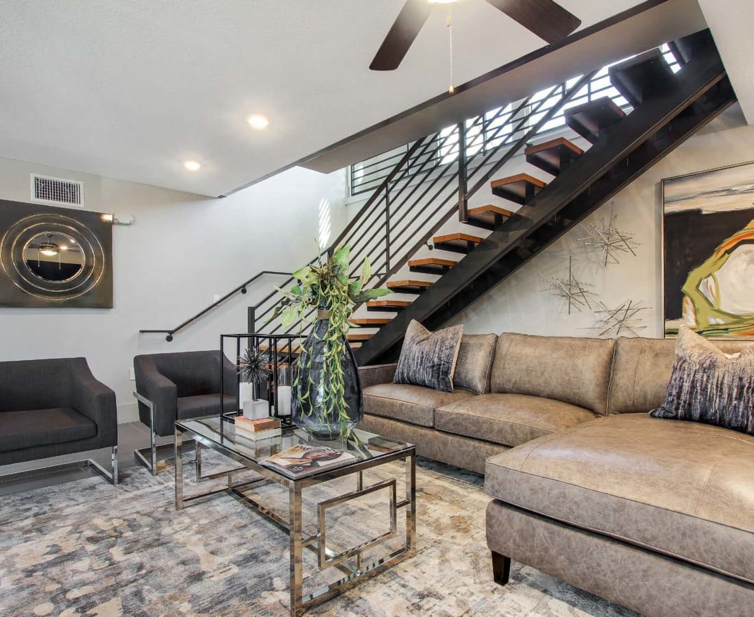 Living room model with stairs at 3800 on Portland in Irving, Texas