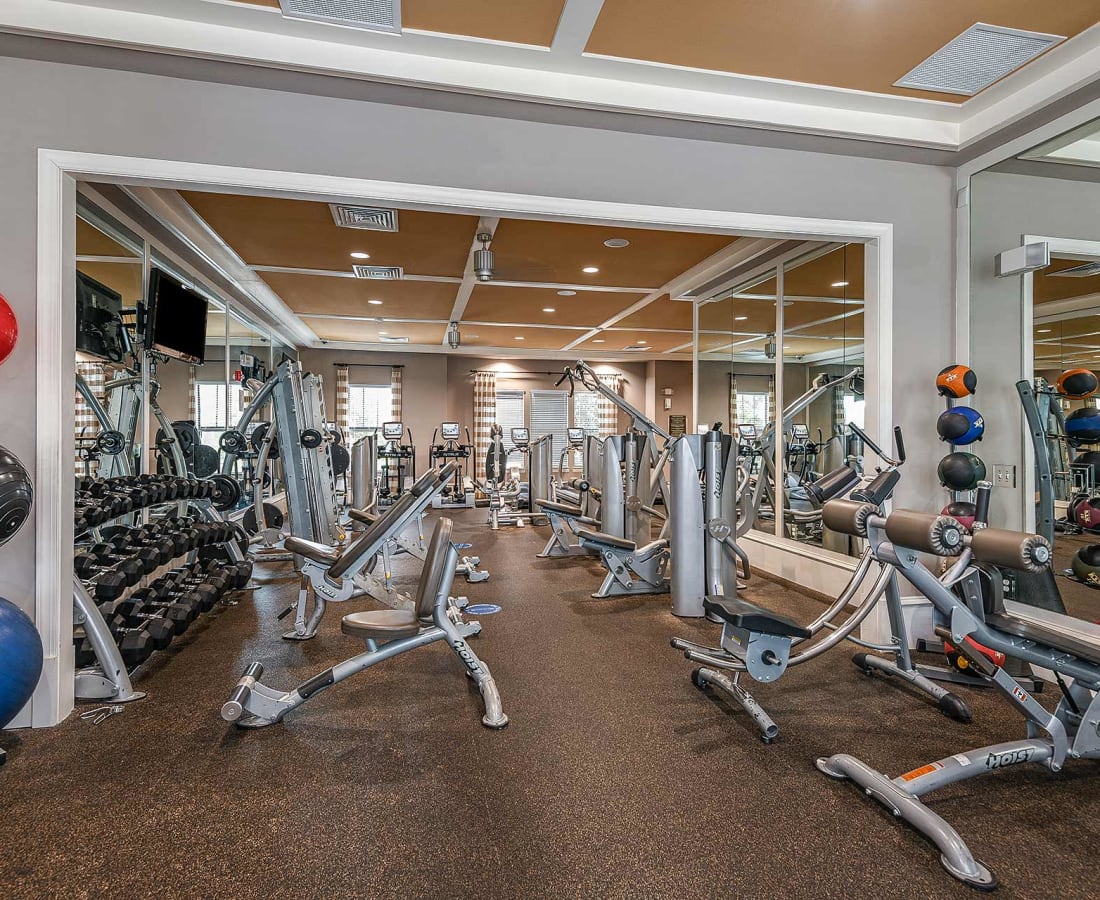machines in the fitness center at Terraces at Town Center in Jacksonville, Florida