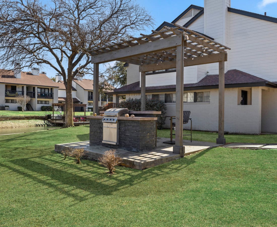 Outdoor community area at Embry Apartments in Carrollton, Texas