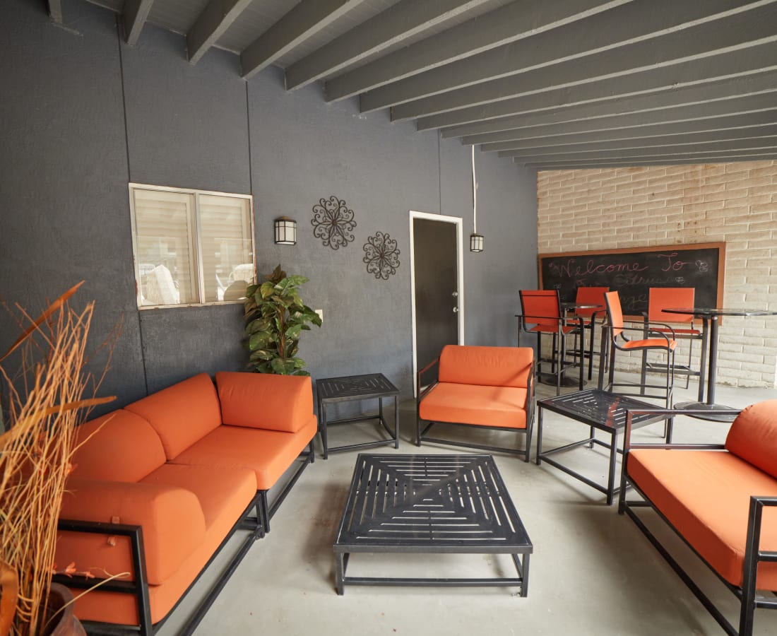 Outdoor lounge seating at Terrace Hill Apts in El Paso, Texas
