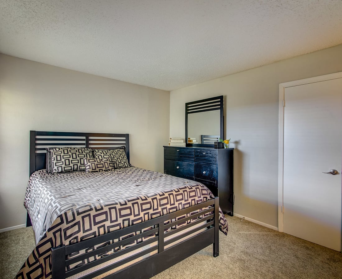 A cozy bedroom at Canyon Grove in Grand Prairie, Texas