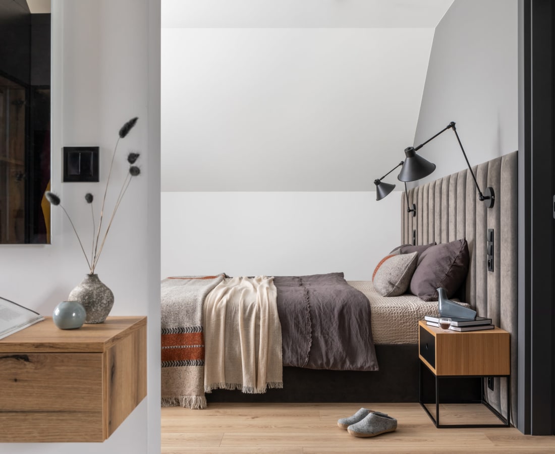 Comfortably furnished bedroom in a model apartment at Cypress Creek at South Cedar in Temple, Texas