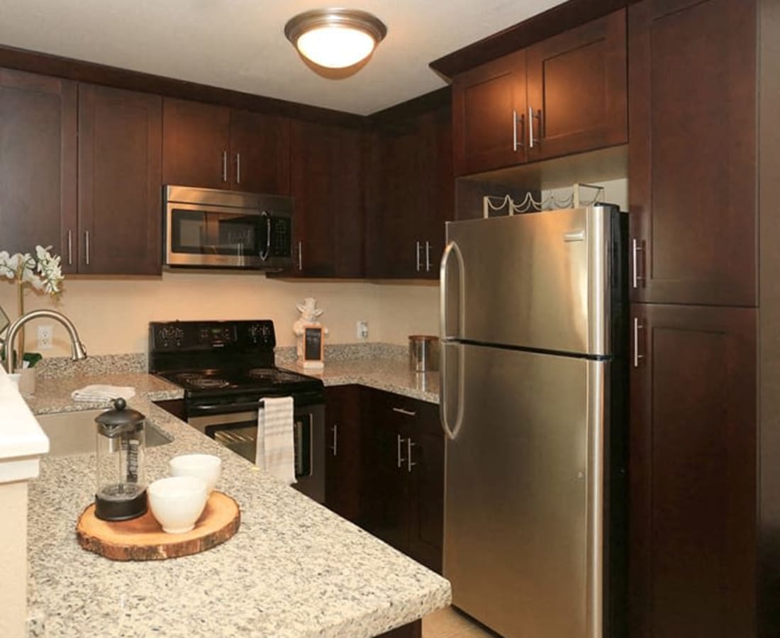 Kitchen with appliances at Hidden Creek in Vacaville, California