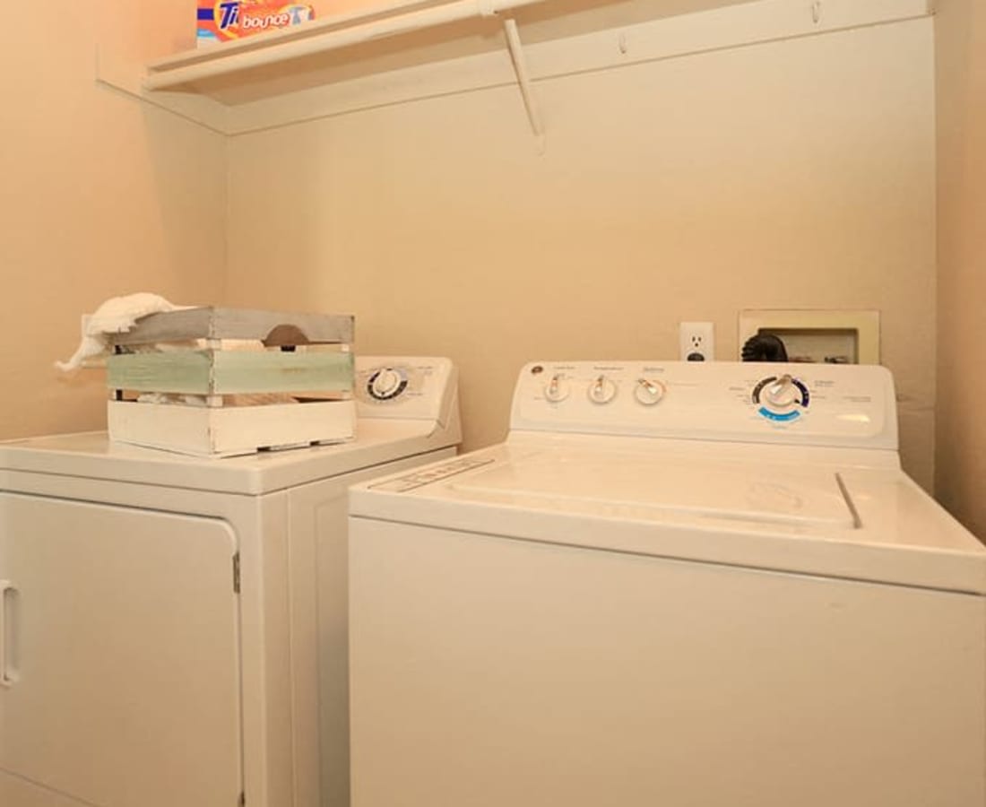 In-unit washer and dryer with extra linen storage at Hidden Creek in Vacaville, California
