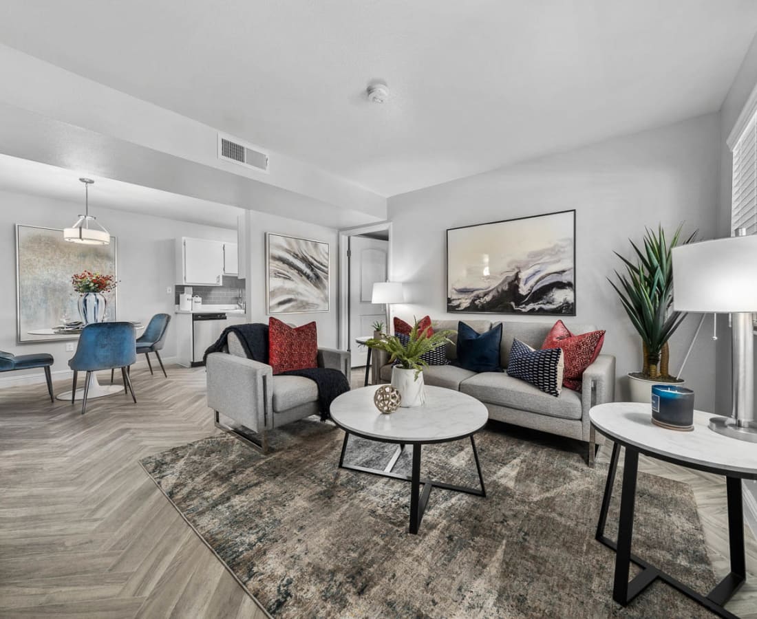 Model living space with soft rug at District 5800 in Las Vegas, Nevada