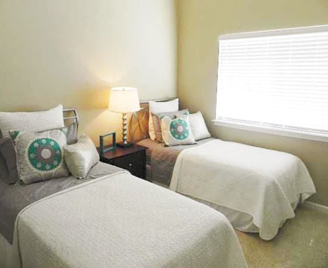 Second bedroom with two beds at DaVinci Apartments in Davis, California
