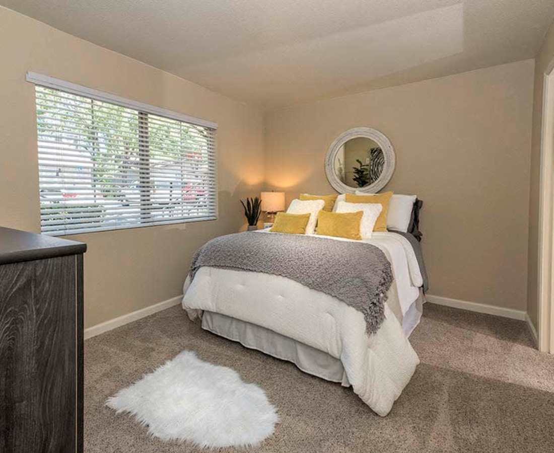 Bedroom and large window at Foxborough in Citrus Heights, California