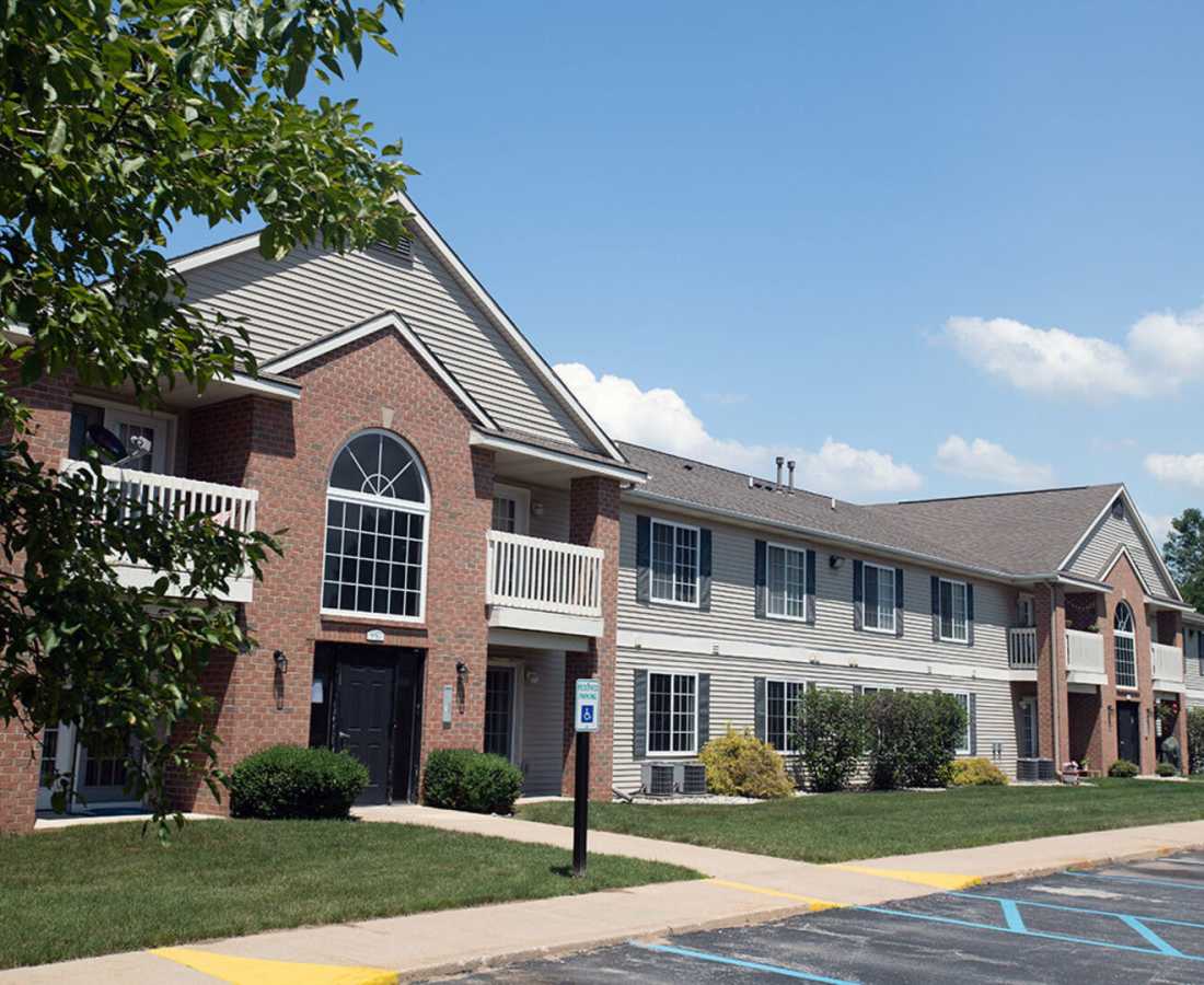 Exterior of apartments at Hamptons of Norton Shores in Norton Shores, Michigan 