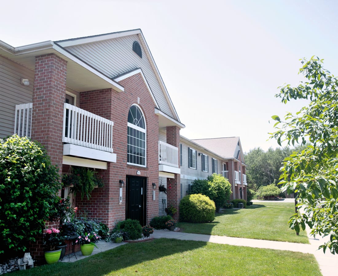 Exterior of apartments at Hamptons of Norton Shores in Norton Shores, Michigan 