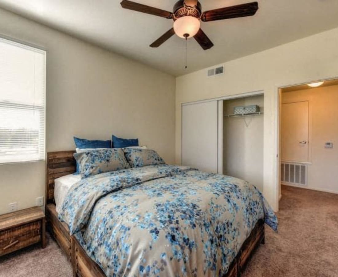Model bedroom with soft carpet at Eaton Village in Chico, California