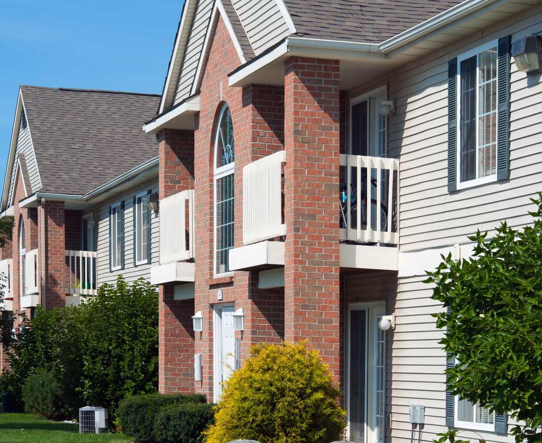 Exterior of apartments at Hamptons of Norton Shores in Norton Shores, Michigan 