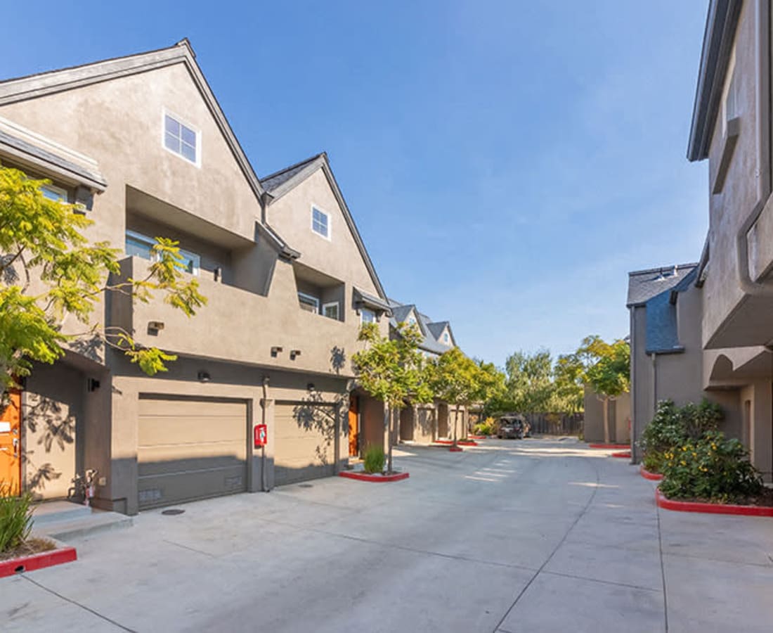 Exterior building with private garage at Clay Street Residences in Santa Cruz, California