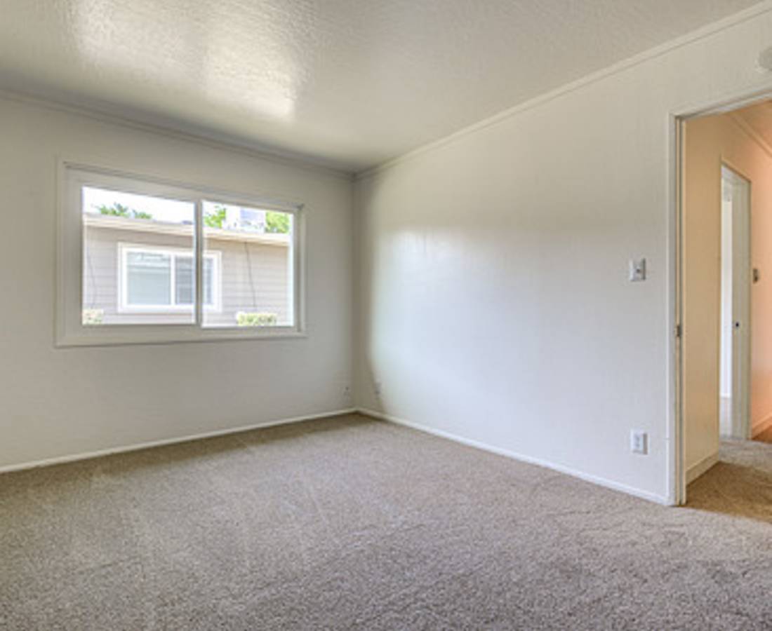 Carpeted room at Delta View Apartments in Antioch, California