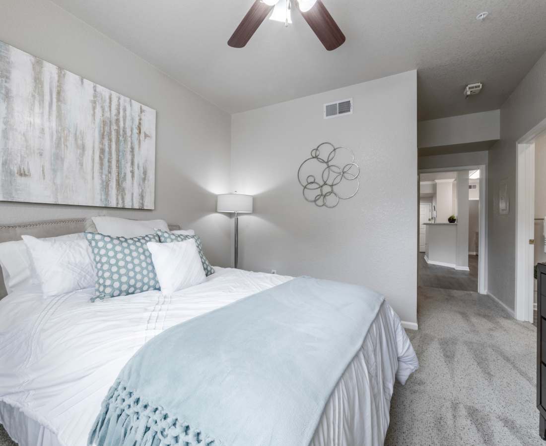 Bedroom with carpet at Oak Brook Apartments in Rancho Cordova, California