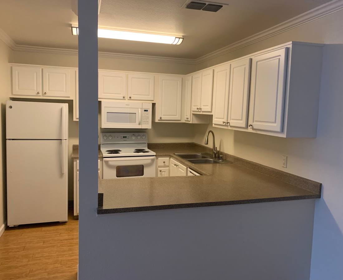 Kitchen with spacious counter space at Waters Edge in Sacramento, California
