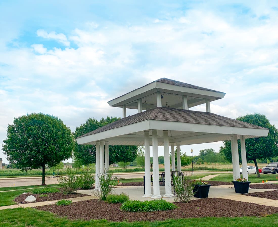Bar seating and conference tables and chairs in the clubhouse lounge at Beaumont in East Lansing, Michigan