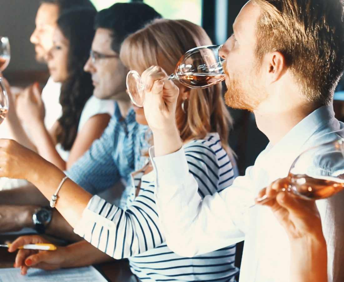Residents wine tasting near Evergreen at River Oaks in Lake Charles, Louisiana