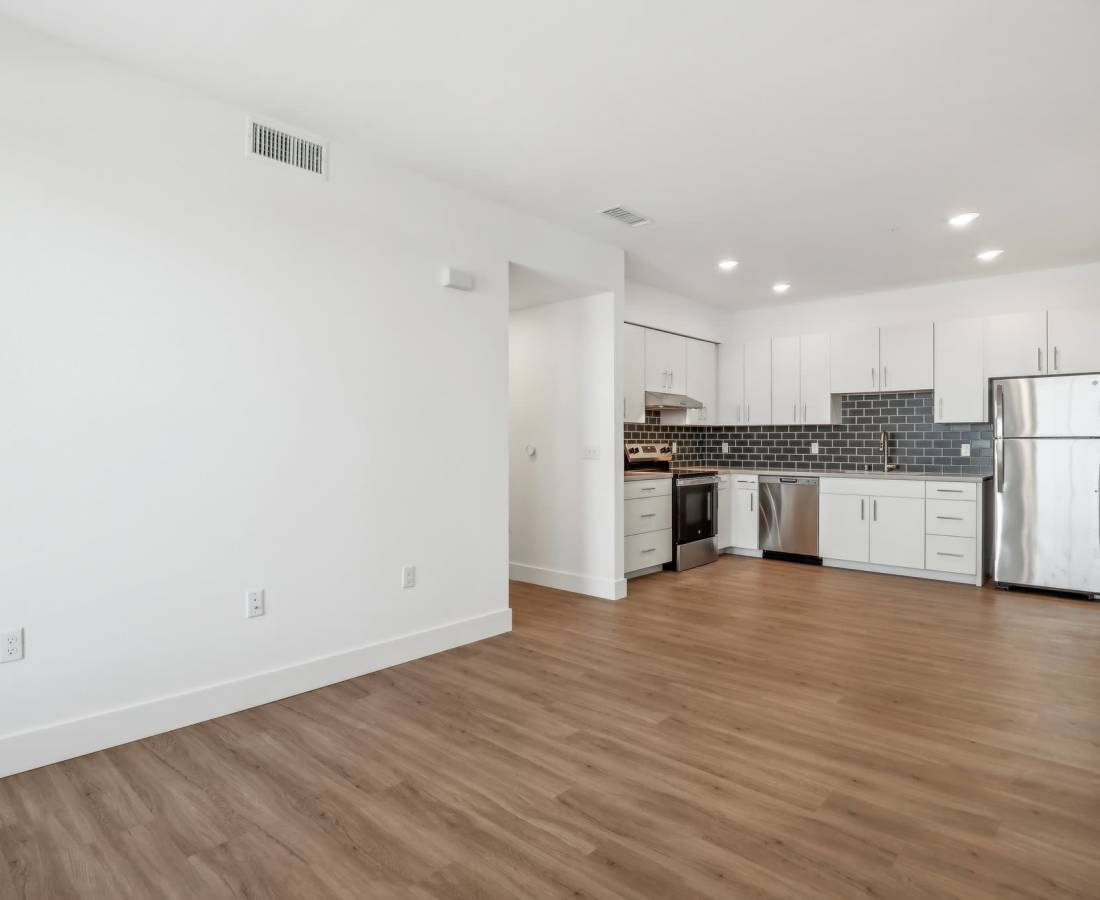 Spacious apartment with wood-style flooring at Prospera at Fiddyment in Roseville, California