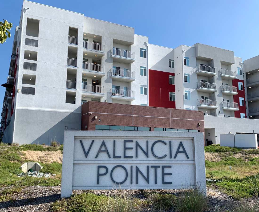 Monument sign outside of Valencia Pointe in San Diego, California