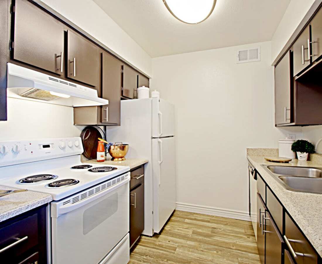 Well equipped kitchen with hardwood flooring at 544 Southern Apartments in Mesa, Arizona