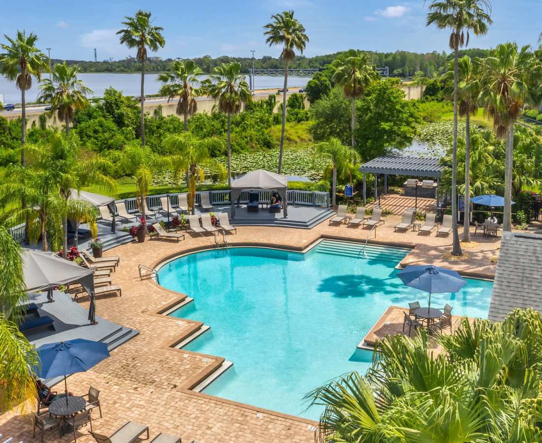 Aerial view of the swimming pool with lounge chairs at Rosemont Windermere in Orlando, Florida