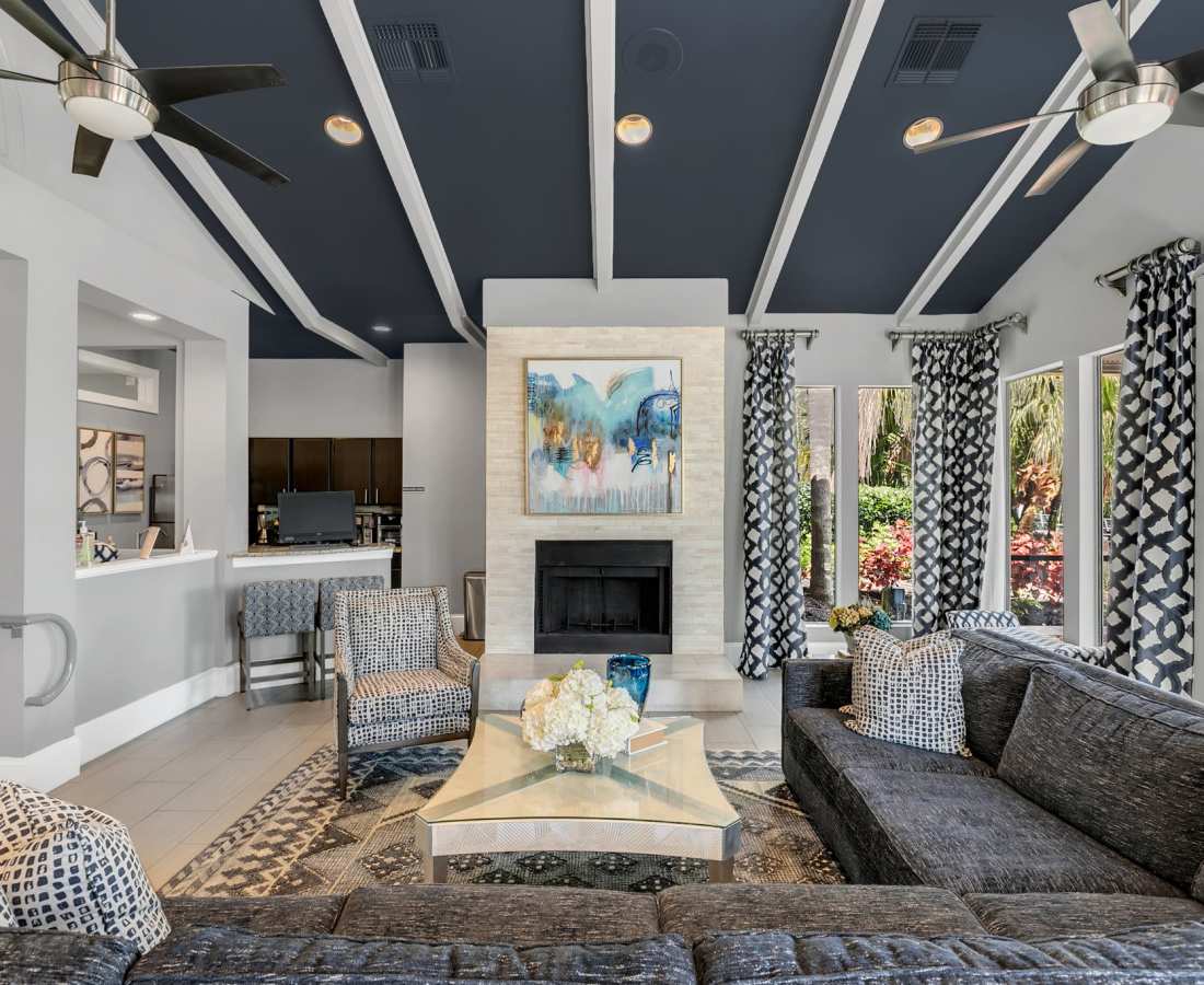 Living room with a firepit at Rosemont Windermere in Orlando, Florida