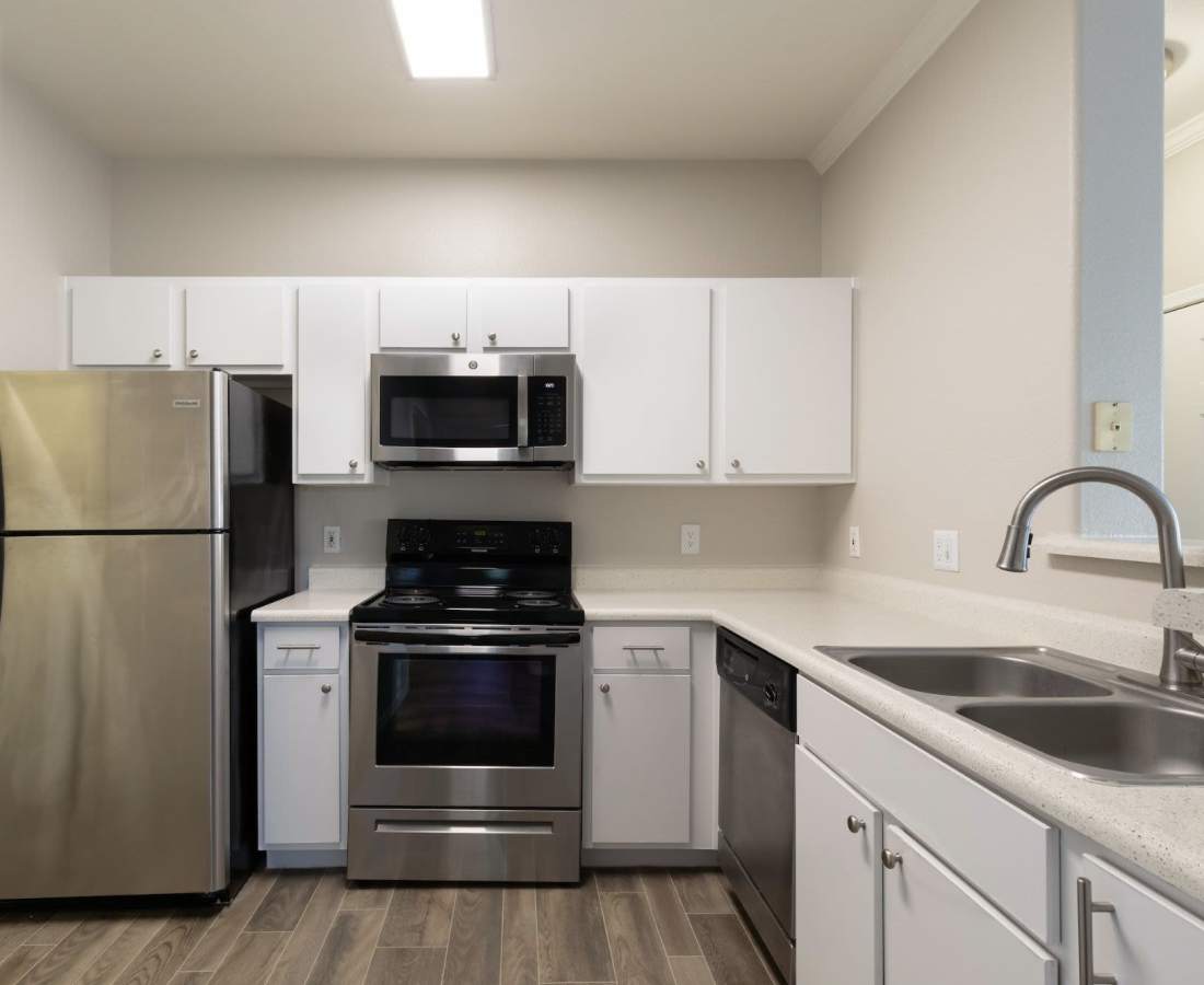Spacious kitchen with hardwood flooring at Sol District in Phoenix, Arizona