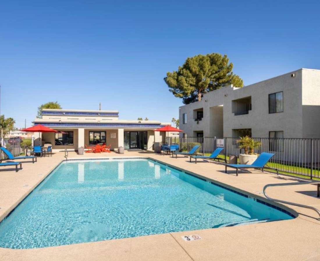 Large swimming pool with lounge beds at Sunpointe in Phoenix, Arizona, 