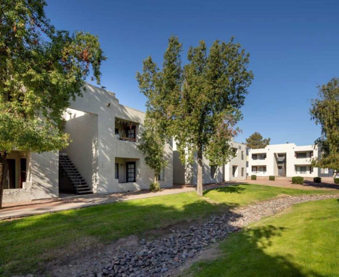 Lots of grass,trees and walking paths in the community at Sunpointe in Phoenix, Arizona, 
