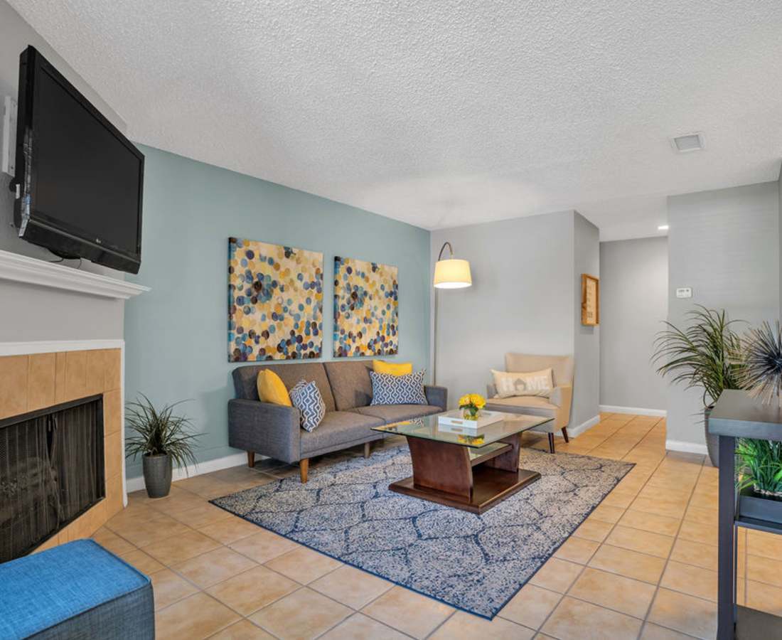 Well decorated living room at The Canopy Apartment Villas in Orlando, Florida