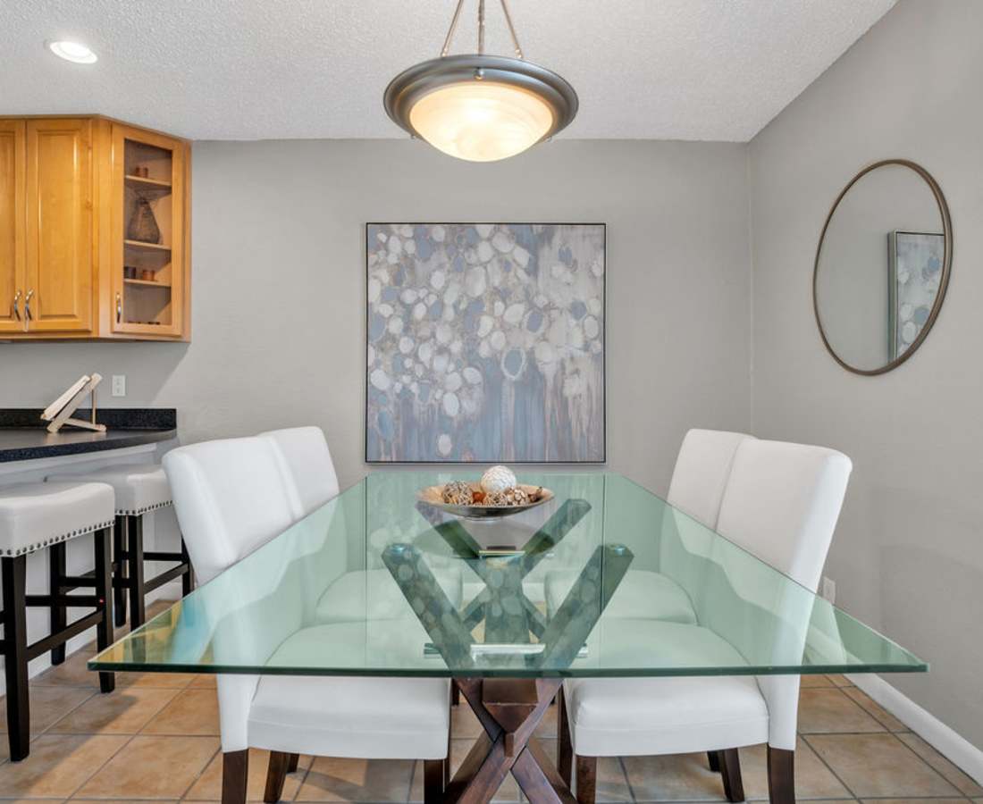 Dining area in the apartment at The Canopy Apartment Villas in Orlando, Florida
