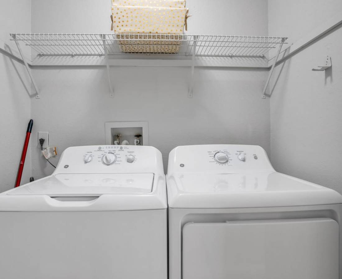 Washer and dryer in the apartment at The Canopy Apartment Villas in Orlando, Florida
