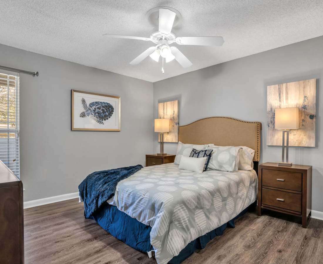 Bedroom with a fan at The Canopy Apartment Villas in Orlando, Florida